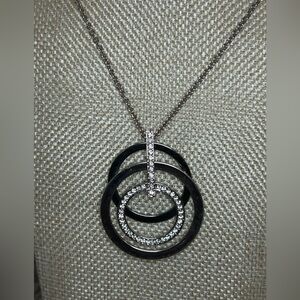 Touchstone Crystal Three Ring Necklace